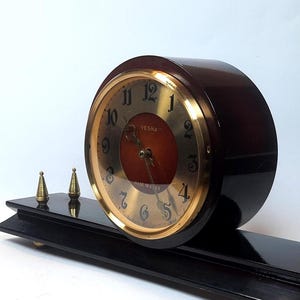 Wooden desk clock. Vintage mantel clock USSR 1970s. Mechanical watch. Old clock with key. Retro style Vesna plant clock.