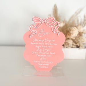 Menu bar avec noeud, menu bar en acrylique, enseigne en acrylique, enseigne girly, menu noeud en arc, enseigne en forme de noeud, enseigne bar en acrylique, menu bar de mariage, enseigne arche, enseigne barre noeud