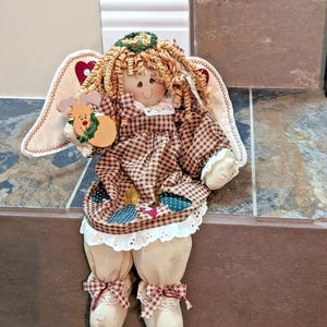 Folk Art Angel Animated Musical Christmas Shelf Sitter