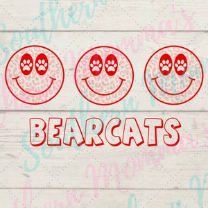 May include: Three red and white smiley faces with paw print eyes and the word "BEARCATS" in red letters on a white background.