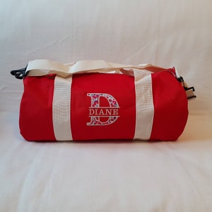 Red XL size duffel bag embroidered and personalized