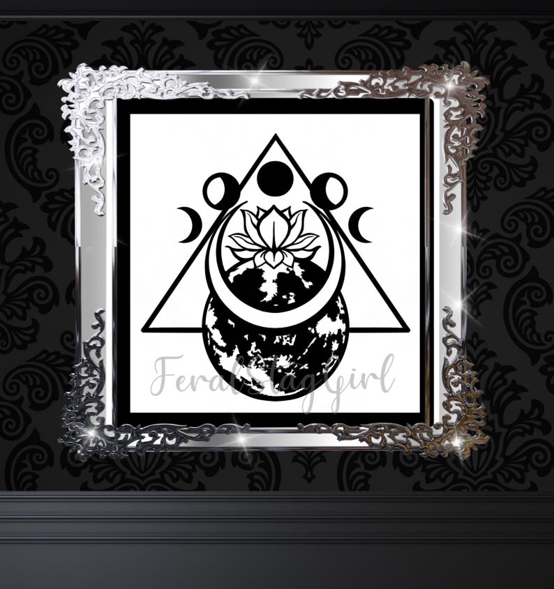 May include: Black and white illustration of a moon, a lotus flower, and a crescent moon inside a triangle. The image is framed in a silver ornate frame.