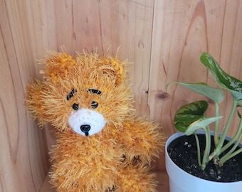 Oso de peluche de hilo dorado con ojos de seguridad