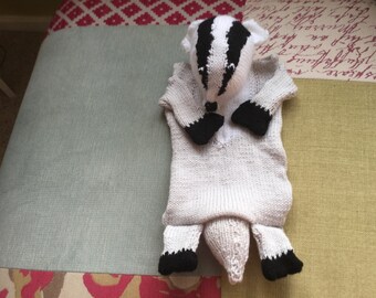 Hand knitted badger hot water bottle cover
