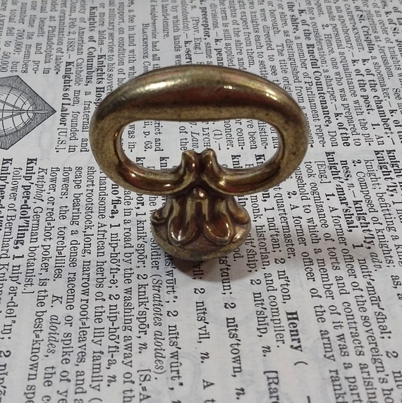 One Antique Brass knob