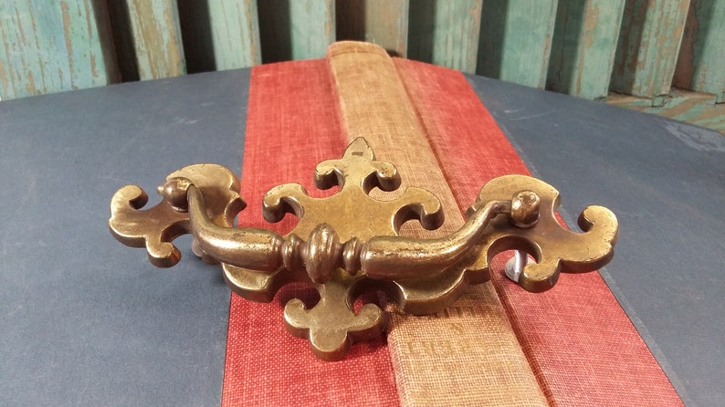 One Original Vintage brass pull with steel bail