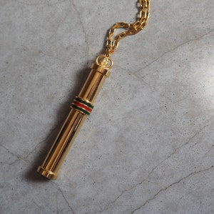 Gucci perfume necklace online