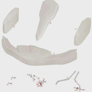 May include: An exploded diagram of go-kart components, featuring a white front bumper, side panels, and other parts. Metal brackets, bolts, and fasteners are also visible, set against a light grey backdrop. The parts are labelled with letters.