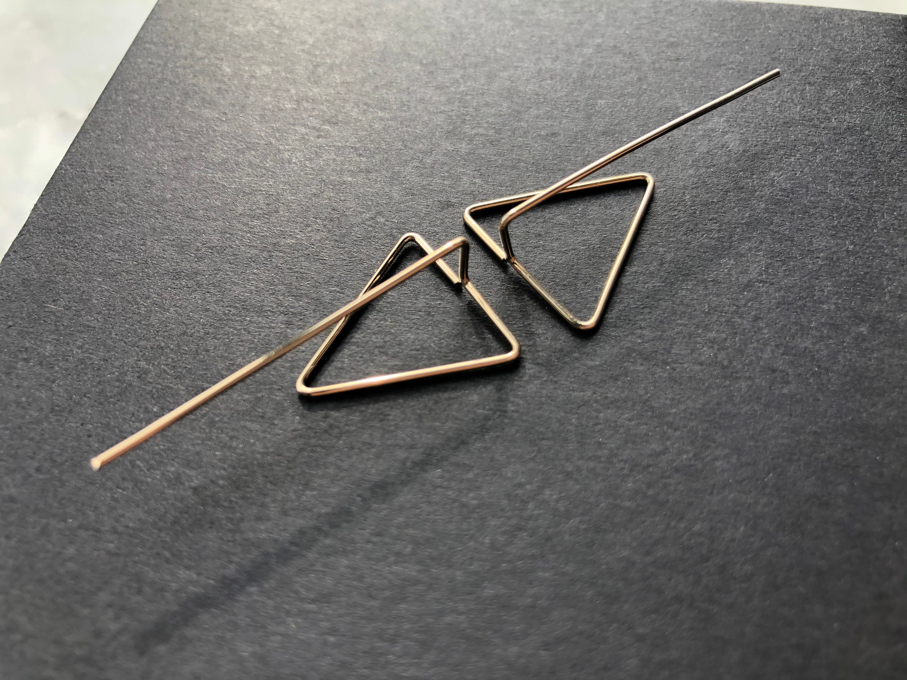 Jewelry trends 2021 Spring gift ideas. Minimalist geometric earrings gold filled and silver triangle shape in mixed metal earrings