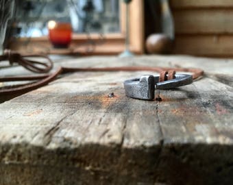 Reclaimed iron ring pendant on leather