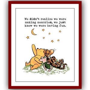 May include: Winnie the Pooh, Piglet, and Tigger are laying on their backs looking up at the night sky. There are stars and a crescent moon in the sky. The quote "We didn't realize we were making memories, we just knew we were having fun." is printed above the characters.
