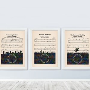 May include: Three framed prints of sheet music with silhouettes of characters from The Lord of the Rings. The first print features the text "Concerning Hobbits" and "The Fellowship of the Ring". The second print features the text "Samwise the Brave" and "The Two Towers". The third print features the text "The Return of the King".