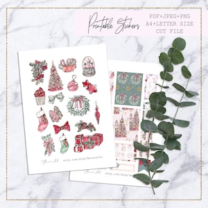 May include: Printable Christmas stickers featuring a variety of festive designs, including a Christmas tree, ornaments, presents, and a snow globe. The stickers are in a pink and green color scheme and are perfect for adding a touch of holiday cheer to your planner, journal, or other projects.