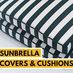 May include: Two black and white striped outdoor cushions. The cushions are stacked on top of each other. The text "SUNBRELLA COVERS & CUSHIONS" is printed in yellow on a white background.