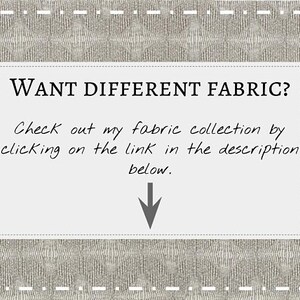 May include: A white text box with a black border and a black arrow pointing down. The text reads "WANT DIFFERENT FABRIC? Check out my fabric collection by clicking on the link in the description below."