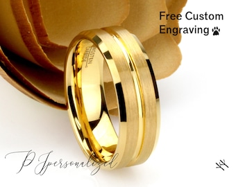 May include: Gold tungsten carbide ring with a brushed finish and two polished gold bands. The ring is engraved with "Tungsten Carbide". Free custom engraving is available.