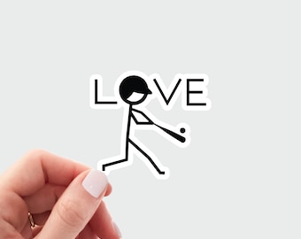 May include: A black and white sticker featuring a stick figure baseball player with the word "LOVE" above them.