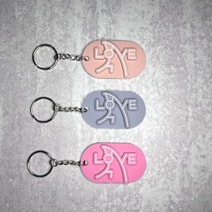Love pole vault keychain, pole vault keyring, pole vaulter keychain, gift for pole vaulter, track and field keychain, pole vaulting gift.