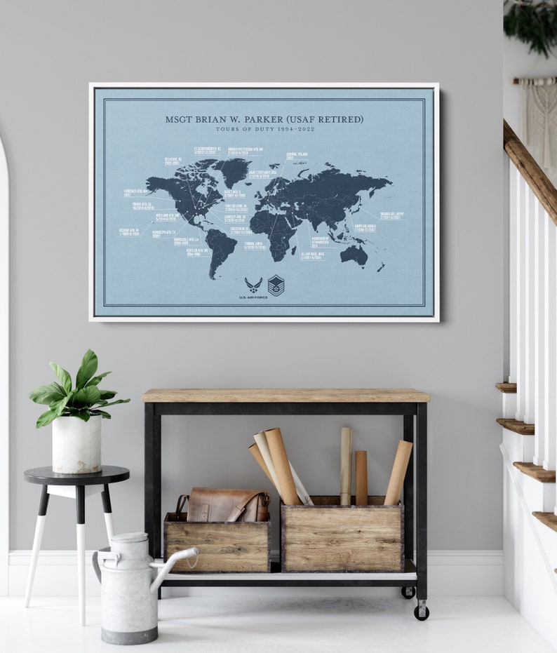 May include: A blue and white world map print with the text "MSGT BRIAN W. PARKER (USAF RETIRED) TOURS OF DUTY 1994-2022" and a US Air Force logo. The map shows various locations around the world.