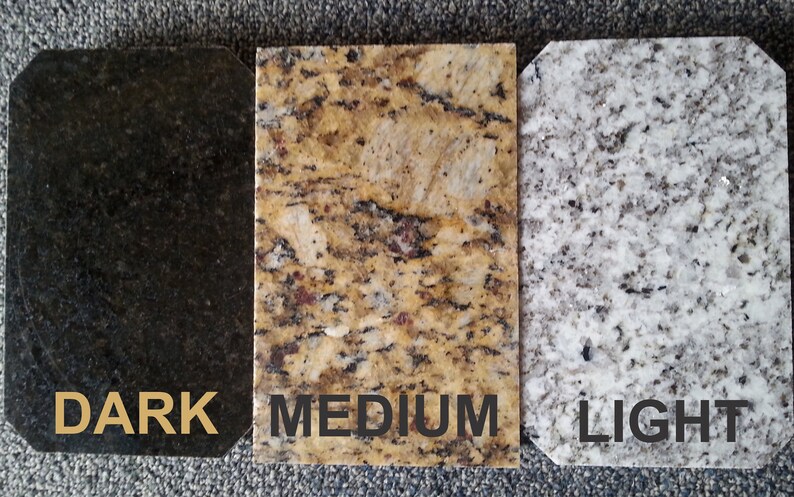 May include: Three granite samples, one dark, one medium, and one light. The samples are labeled "DARK", "MEDIUM", and "LIGHT".
