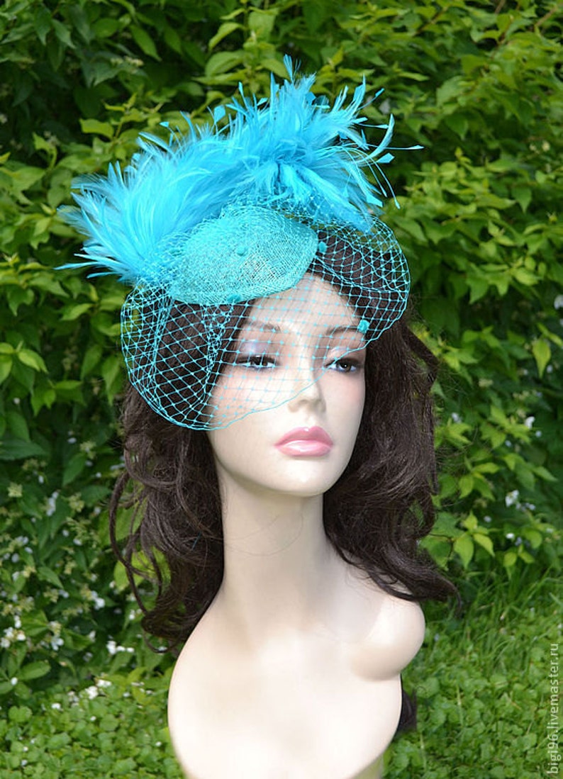 small turquoise fascinator