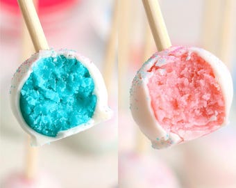 Cake pops azules y rosas para revelar el sexo del bebé.