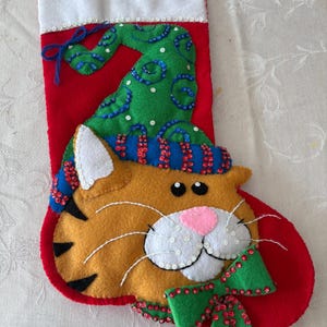 May include: A rustic wooden sign with the text "Welcome to our home" in a handwritten style. The sign features a distressed finish and a simple, inviting design, perfect for a front porch or entryway.