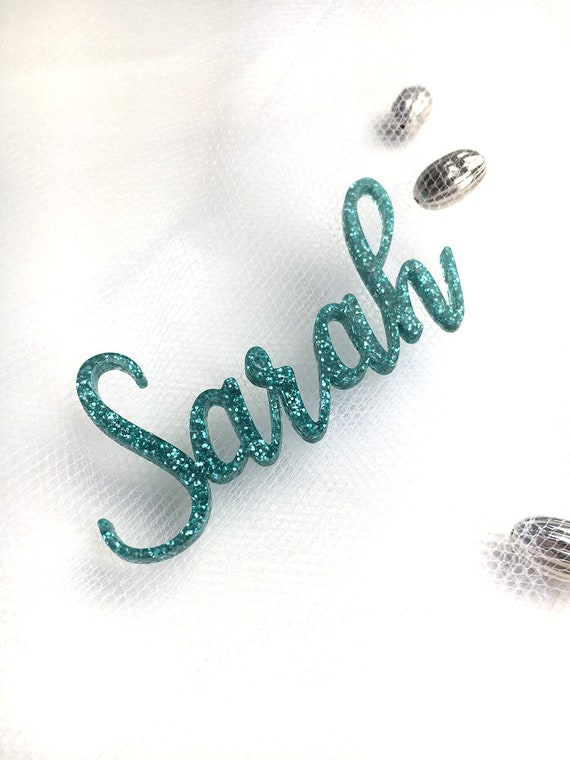 Laser cut silver glitter acrylic place names ideal for weddings Place