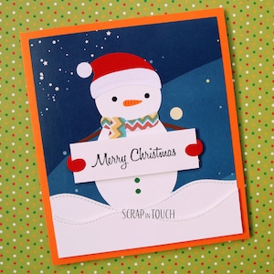 Merry Christmas card "Snowman with Merry Christmas sign"