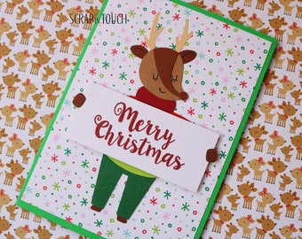 Tarjeta de Feliz Navidad "Reno con cartel de Feliz Navidad"