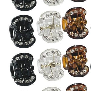 May include: Twelve small hair clips with rhinestones. Six clips are black, three are clear, and three are brown.