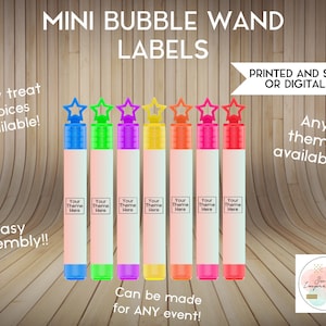 May include: Mini bubble wand labels with a star-shaped wand topper. The labels are white with black text that says "Your Theme Here". The labels are shown on a variety of colored bubble wands, including blue, green, purple, yellow, orange, pink, and red. The labels can be printed and shipped or provided as a digital file. The text "Any theme available!" is also included in the image.