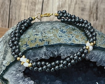 3mm Hematite Beads and Freshwater Pearl on Yellow Gold Metal Base