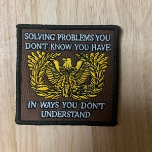 Warrant Officer &quot;Solving Problems You Don&#39;t Know You Have In Ways You Don&#39;t Understand&quot; Eagle Rising Esprit De Corp morale tactical patch