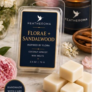 May include: A clear plastic package of wax melts with the text "FLORAE + SANDALWOOD" and "COCONUT APRICOT" on a navy blue label. The package contains 2.5 oz / 70 g of wax melts. A lit candle and loose wax cubes are also visible.