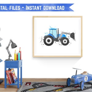 May include: A digital printable featuring a blue tractor with a black bucket, painted in a watercolor style with black splatters on a white background. The tractor is framed in a light wood frame.
