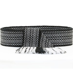 May include: Black and white woven belt with a fringe. The belt has a chevron pattern.