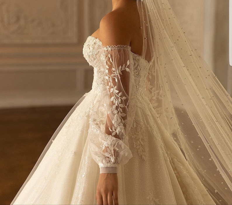 wedding gown with removable lace sleeves