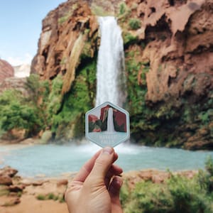 Havasu falls sticker in front of Havasu waterfall in Arizona