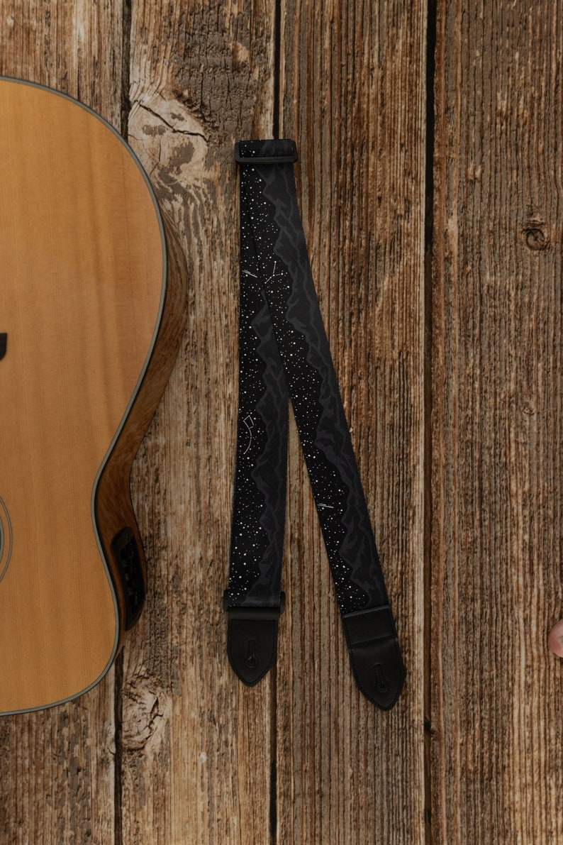 Black Guitar strap printed with stars and mountains