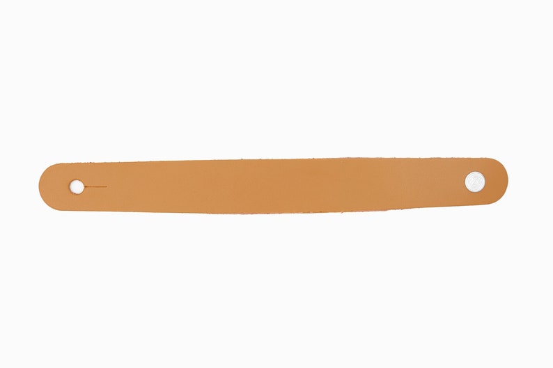 Brown leather headstock adapter