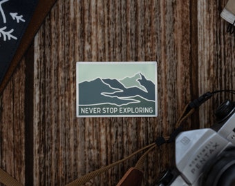 Never Stop Exploring Sticker | Laptop vinyl decal | Car Decal | waterproof water bottle Sticker | Hiking and Mountains