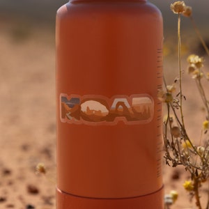 Moab Utah Sticker shown placed on a water bottle