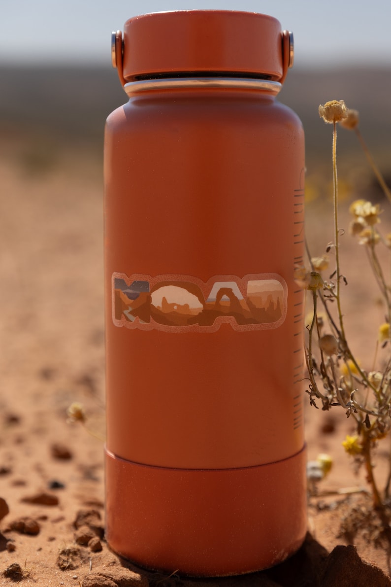 Moab Utah Sticker shown placed on a water bottle