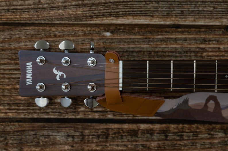 close up up brown leather headstock adapter