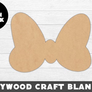 Op de afbeelding: Een bruine houten boog vormige ambachtelijke blanco, 1/8 inch dik. De tekst PLYWOOD CRAFT BLANKS staat onderaan de afbeelding.