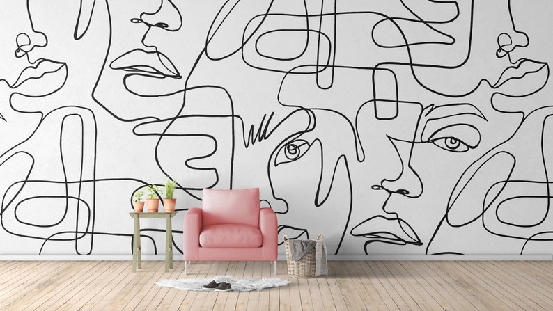A modern abstract line art wallpaper mural featuring continuous black outlines of faces on a white background. Minimalist wall decor for a stylish living room, bedroom accent wall, hallway, office or creative studio.