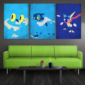 May include: A set of three rectangular wall art prints featuring stylized blue frog-like creatures. The first panel shows a close-up of a light blue creature, the second shows a full-body blue creature, and the third shows a dark blue creature.