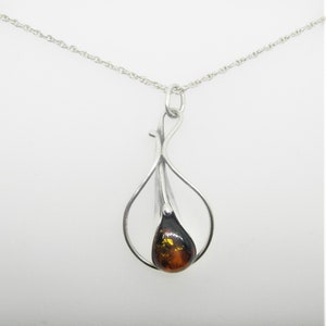 Amber sterling silver art designed pendant vintage