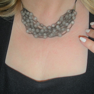 Avant Garde necklace sterling silver gemstones and silk